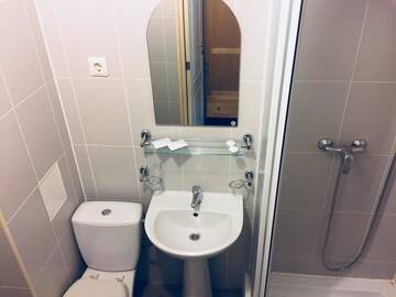 Фото номера Двухместный номер с 2 отдельными кроватями Отель Olimpija Hotel &amp; SPA г. Даугавпилс 7